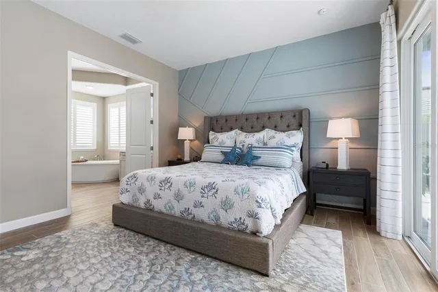 a view of a livingroom with workspace and a couch