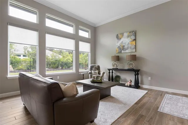 a kitchen with stainless steel appliances kitchen island granite countertop a refrigerator sink and stove