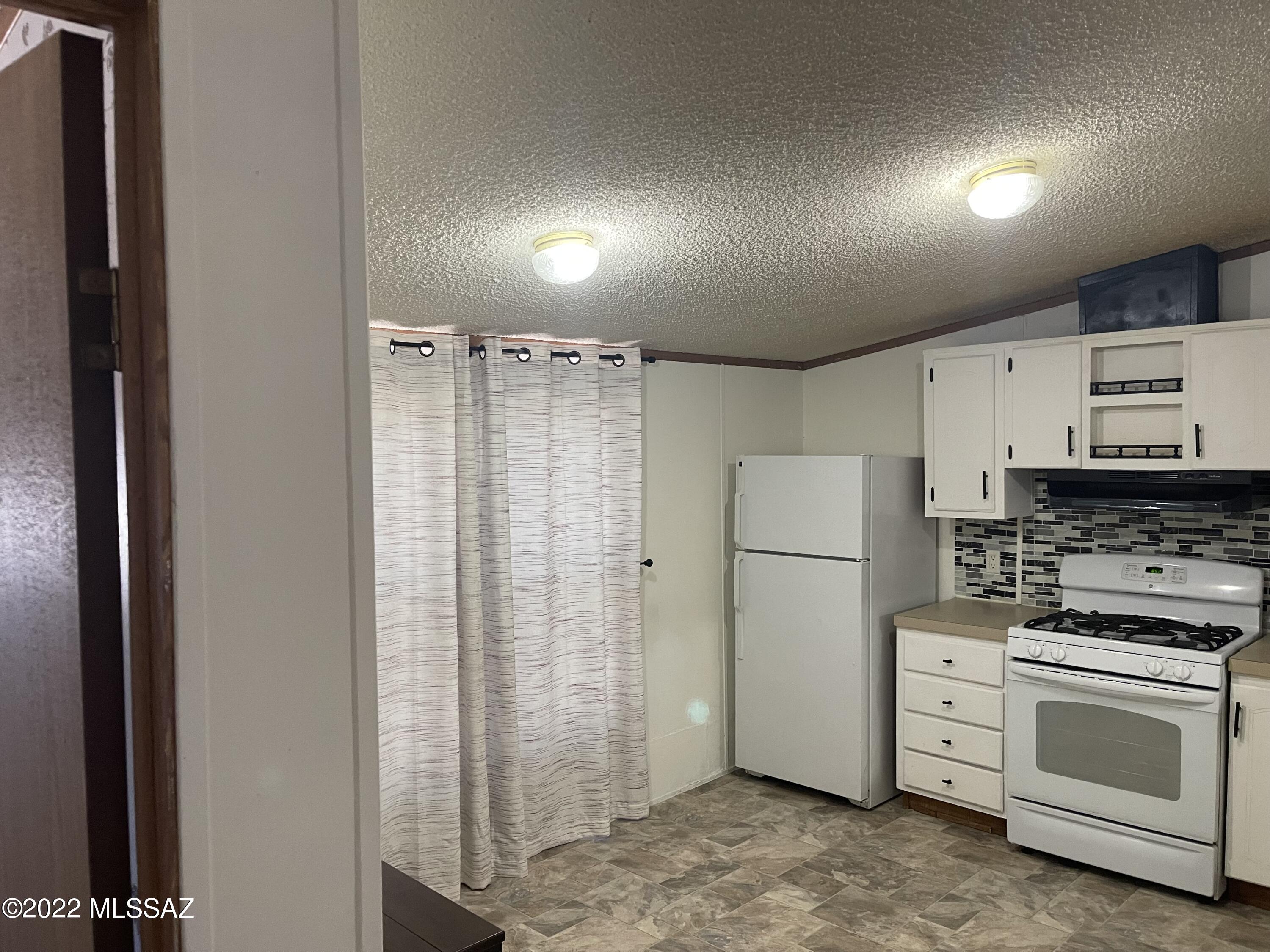 4121 West Tetakusim Road, Unit 2 Tucson, AZ 85746 - Photo 2 of 31