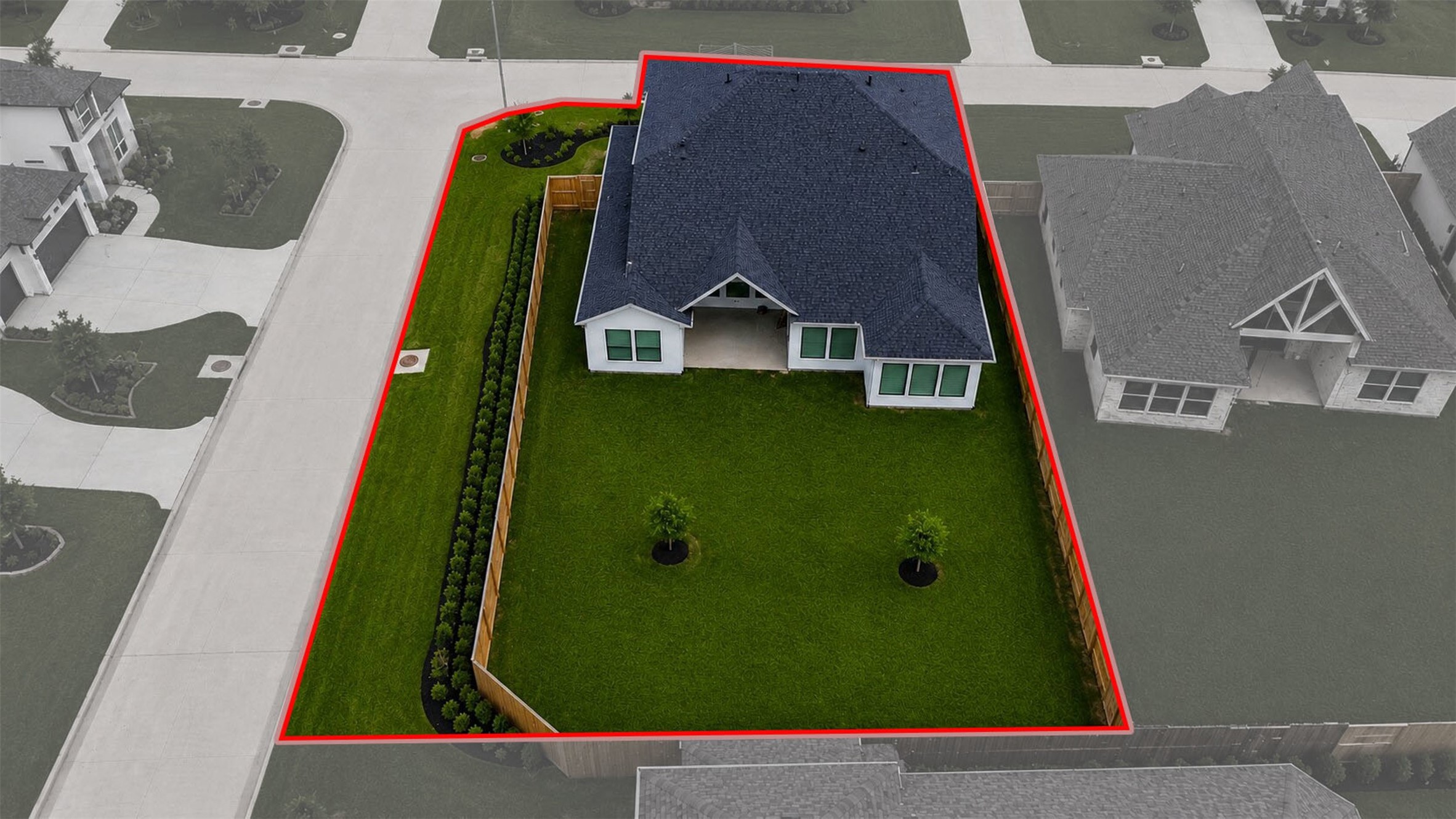 416 Venado View Court Conroe, TX 77304 - Photo 31 of 34 Rare oversized backyard with ample green space and covered patio offering endless possibilities for a future pool, outdoor kitchen, or private retreat.