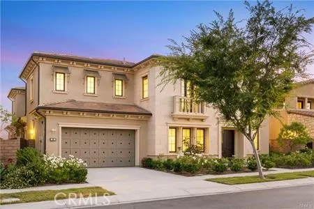 a front view of a house with yard