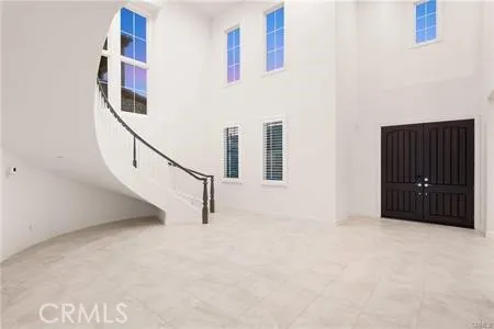 a view of an entryway with stairs