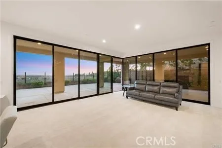 a view of lobby with furniture and floor to ceiling window