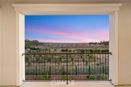 a view of a lake from a balcony