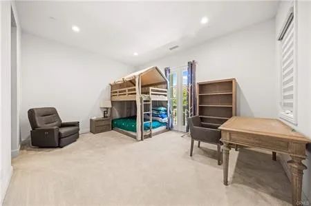 a view of a livingroom with furniture and furniture