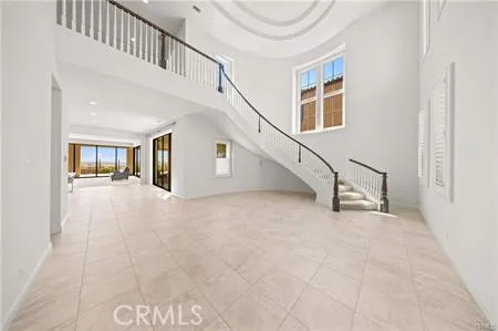 a view of staircase and living room