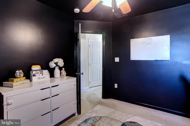 a room with cabinets and wooden floor