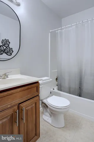 a bathroom with a toilet and a sink