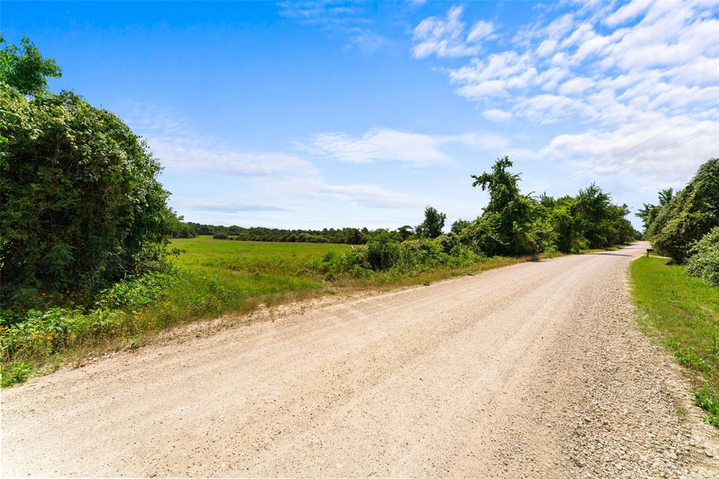 2874 Old Boone Prairie Road Franklin, TX 77856 - Photo 7 of 13 a view of a road with a yard