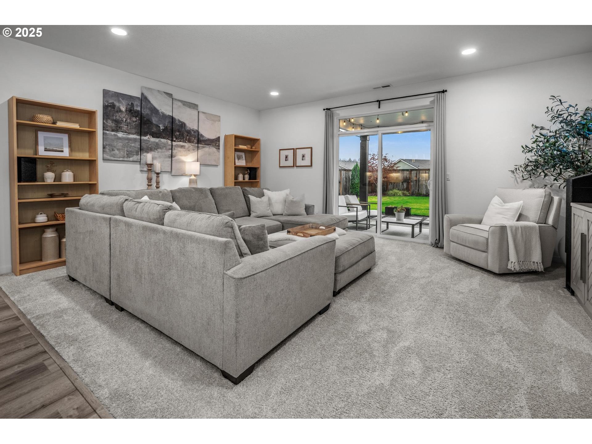 2427 South Linden Street Cornelius, OR 97113 - Photo 11 of 37 a living room with furniture and a large window