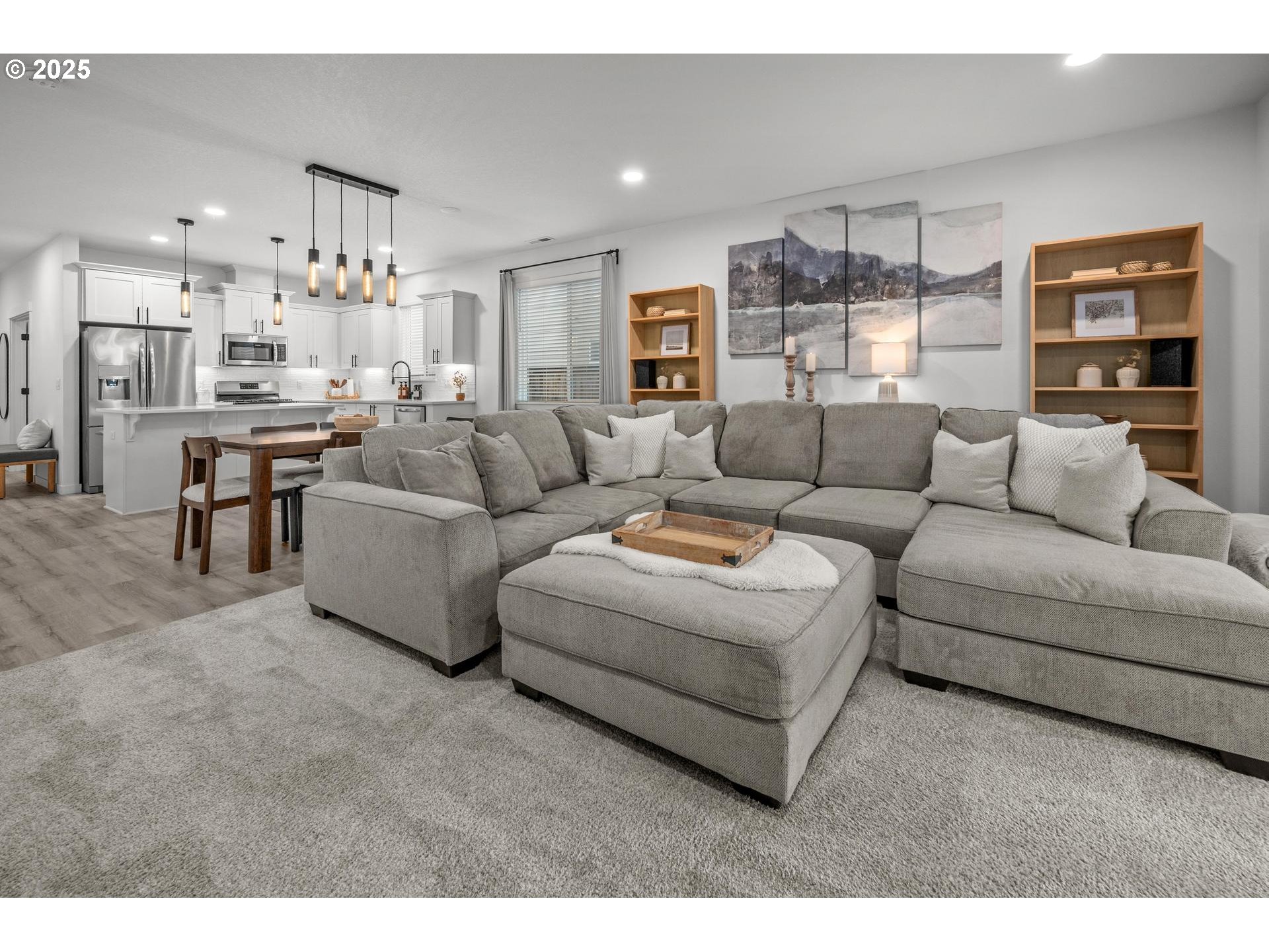 2427 South Linden Street Cornelius, OR 97113 - Photo 12 of 37 a living room with furniture and kitchen view