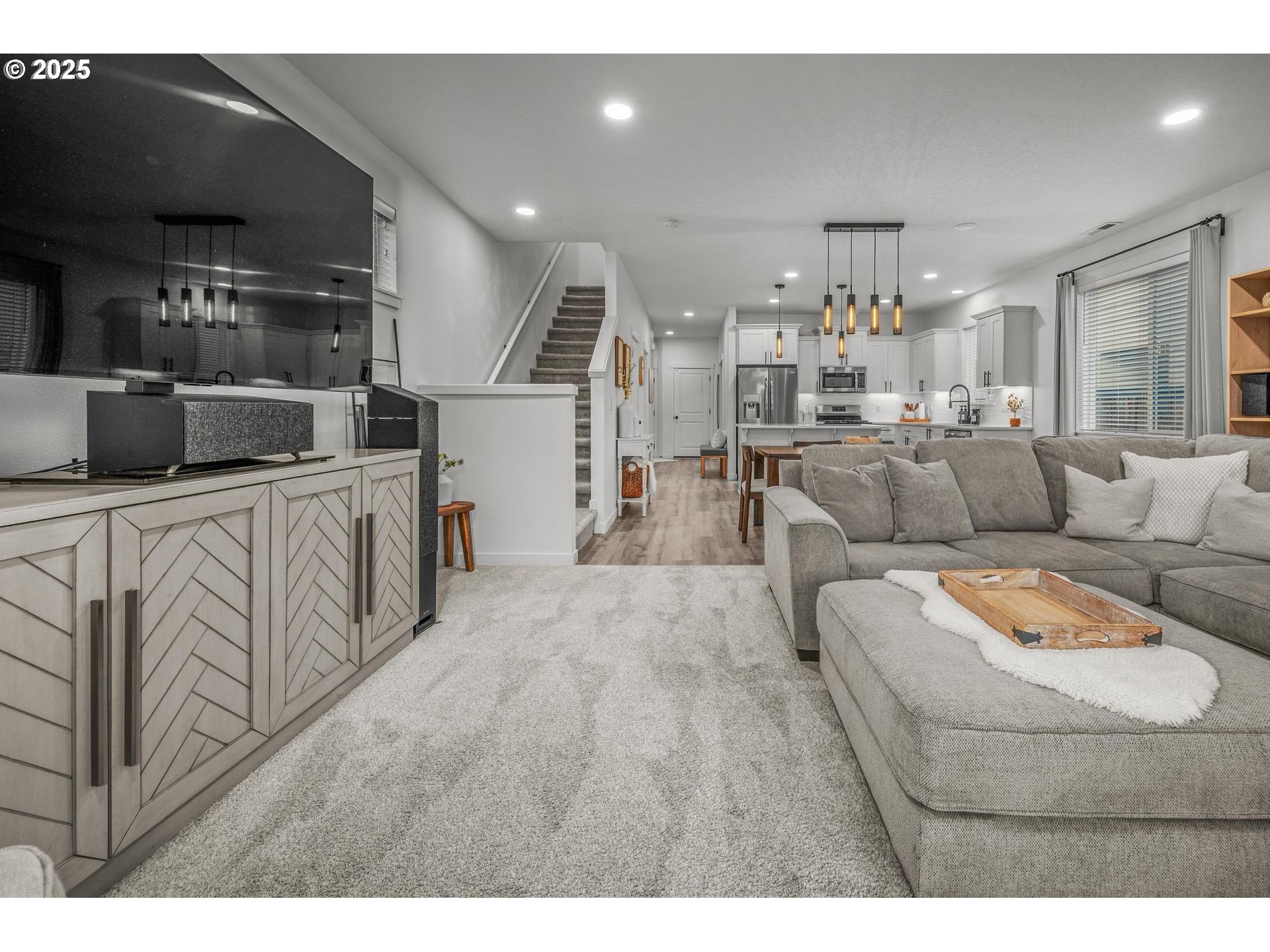 2427 South Linden Street Cornelius, OR 97113 - Photo 13 of 37 a living room with furniture and a flat screen tv