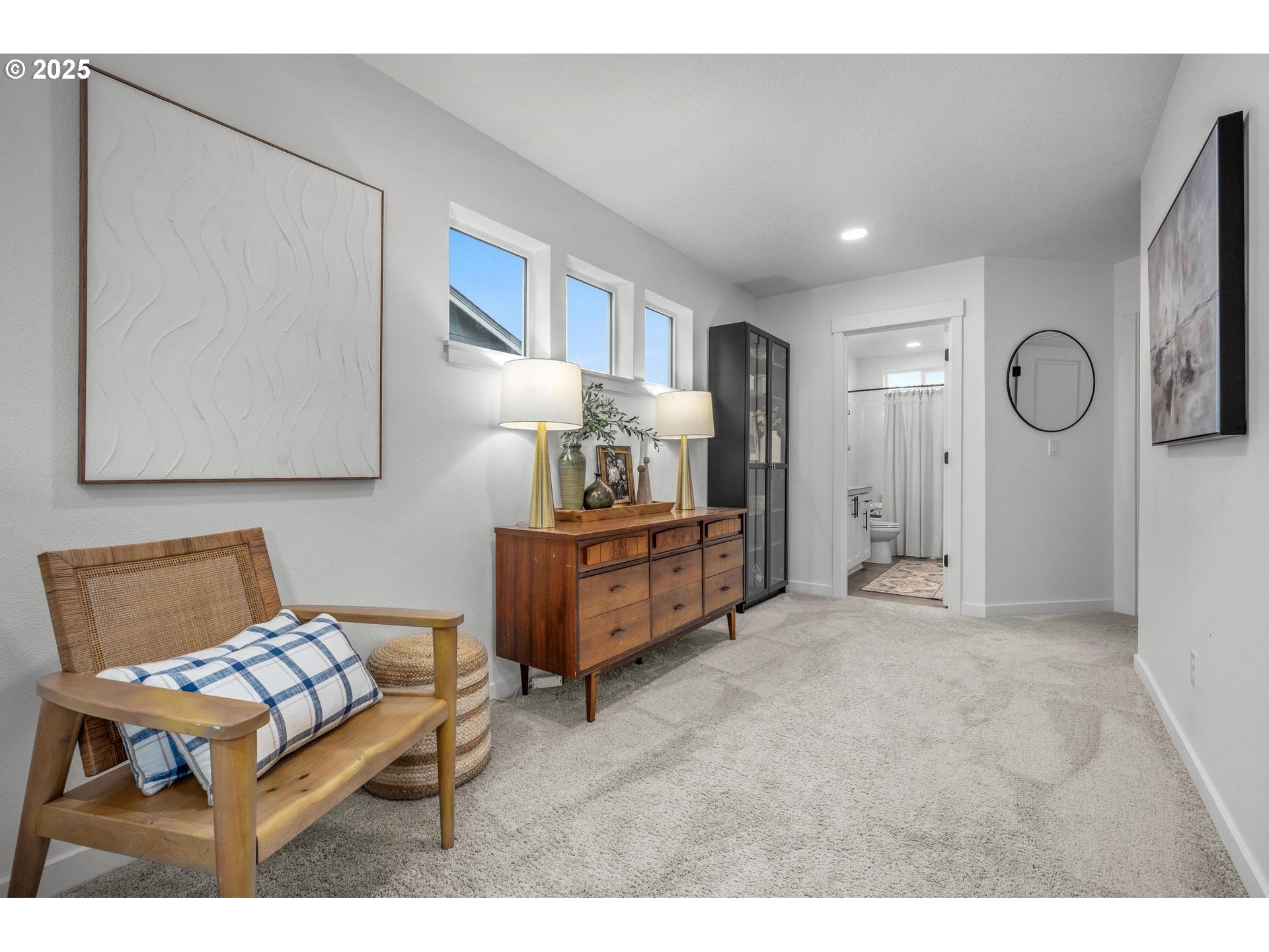 2427 South Linden Street Cornelius, OR 97113 - Photo 21 of 37 a bedroom with furniture and a large mirror