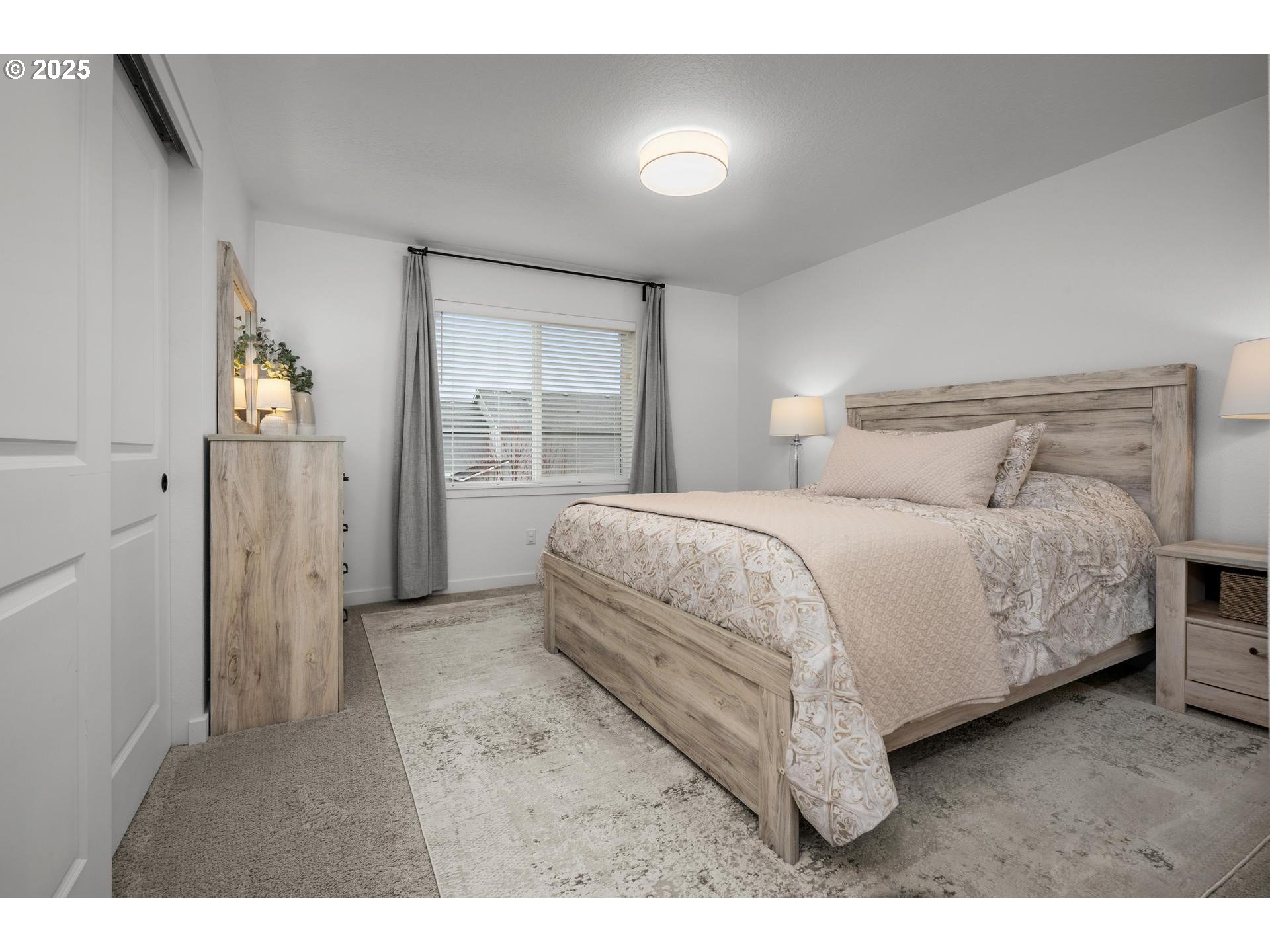 2427 South Linden Street Cornelius, OR 97113 - Photo 27 of 37 a bedroom with a bed and a window