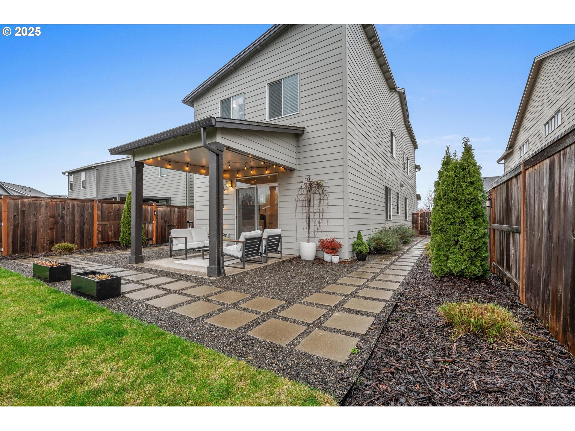 2427 South Linden Street Cornelius, OR 97113 - Photo 34 of 37 a view of a house with backyard and sitting area