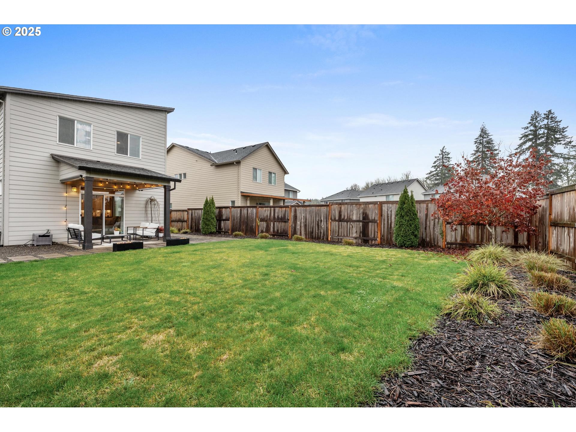 2427 South Linden Street Cornelius, OR 97113 - Photo 36 of 37 a view of an house with backyard space and balcony