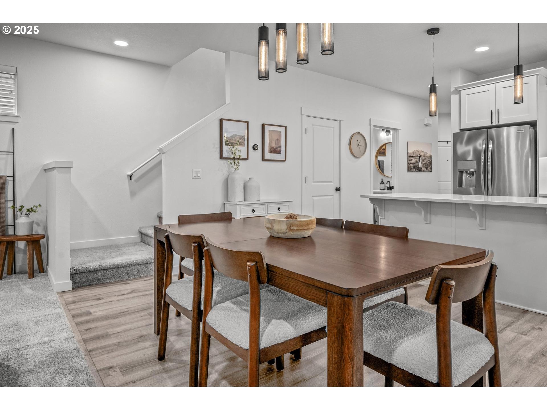 2427 South Linden Street Cornelius, OR 97113 - Photo 8 of 37 a view of a dining room with furniture and wooden floor