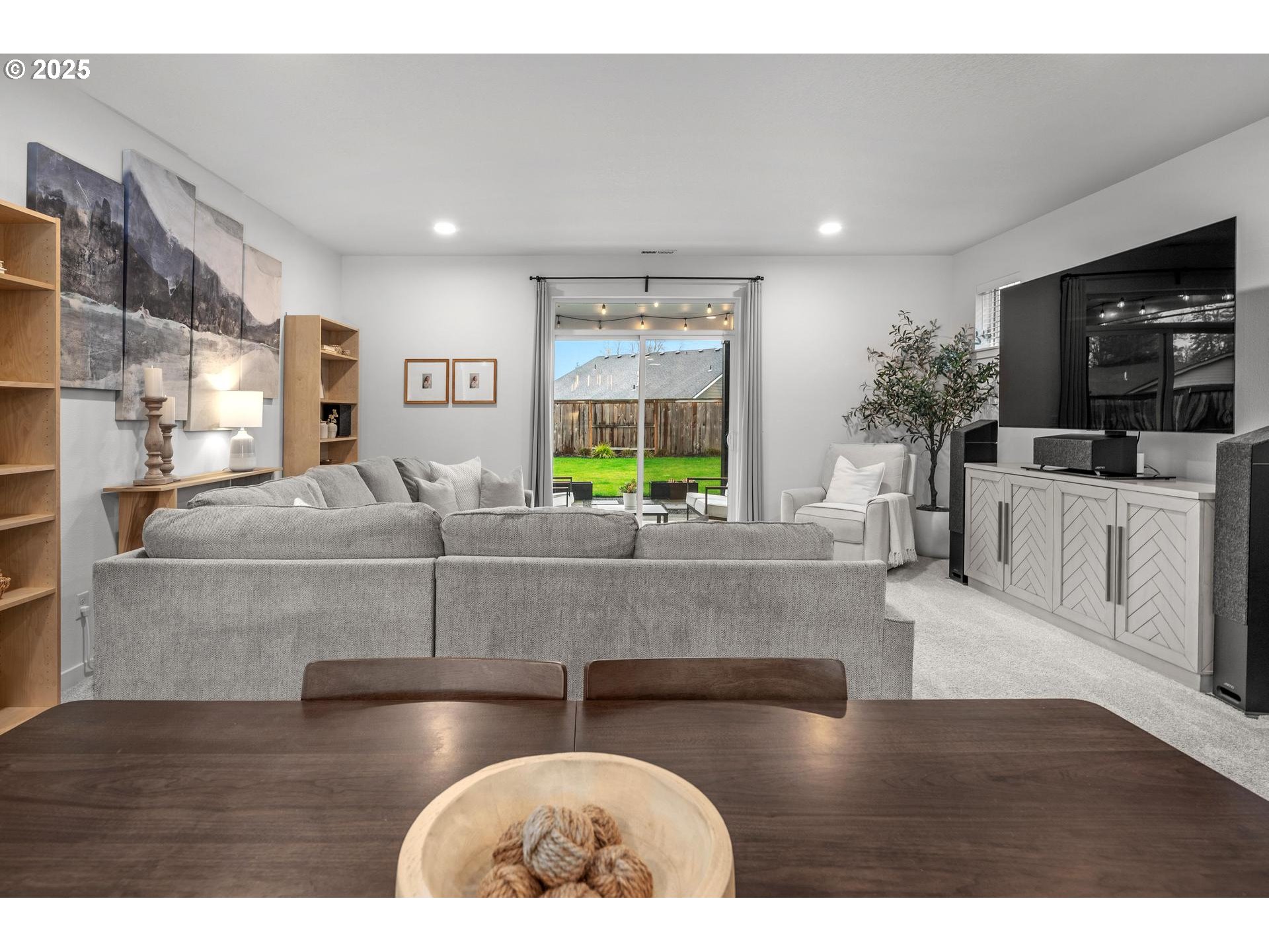 2427 South Linden Street Cornelius, OR 97113 - Photo 10 of 37 a living room with furniture and a flat screen tv