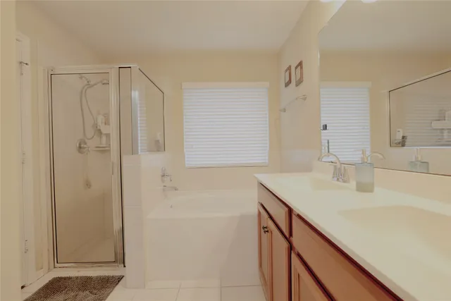 a bedroom with a bed and a table in it