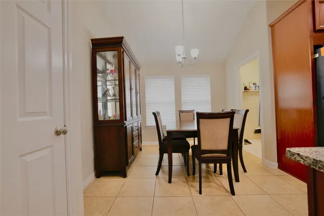 a view of a kitchen and dining room