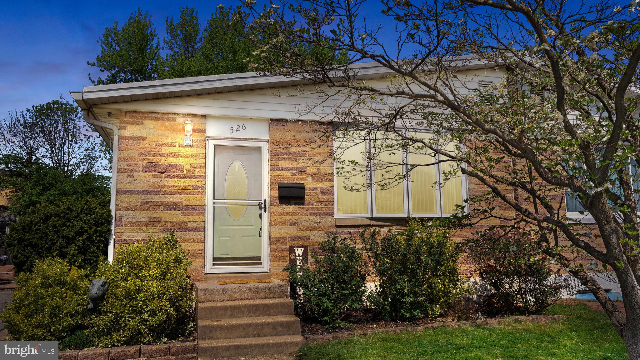 526 Palmer Road Conshohocken, PA 19428 - Photo 1 of 31 a front view of a house with garden