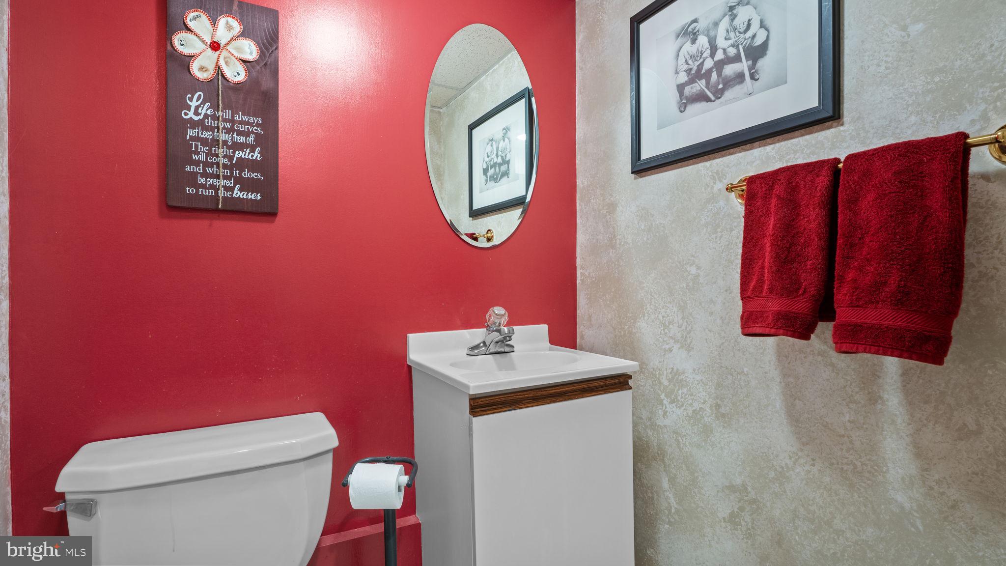 526 Palmer Road Conshohocken, PA 19428 - Photo 26 of 31 a bathroom with a toilet a sink and a mirror