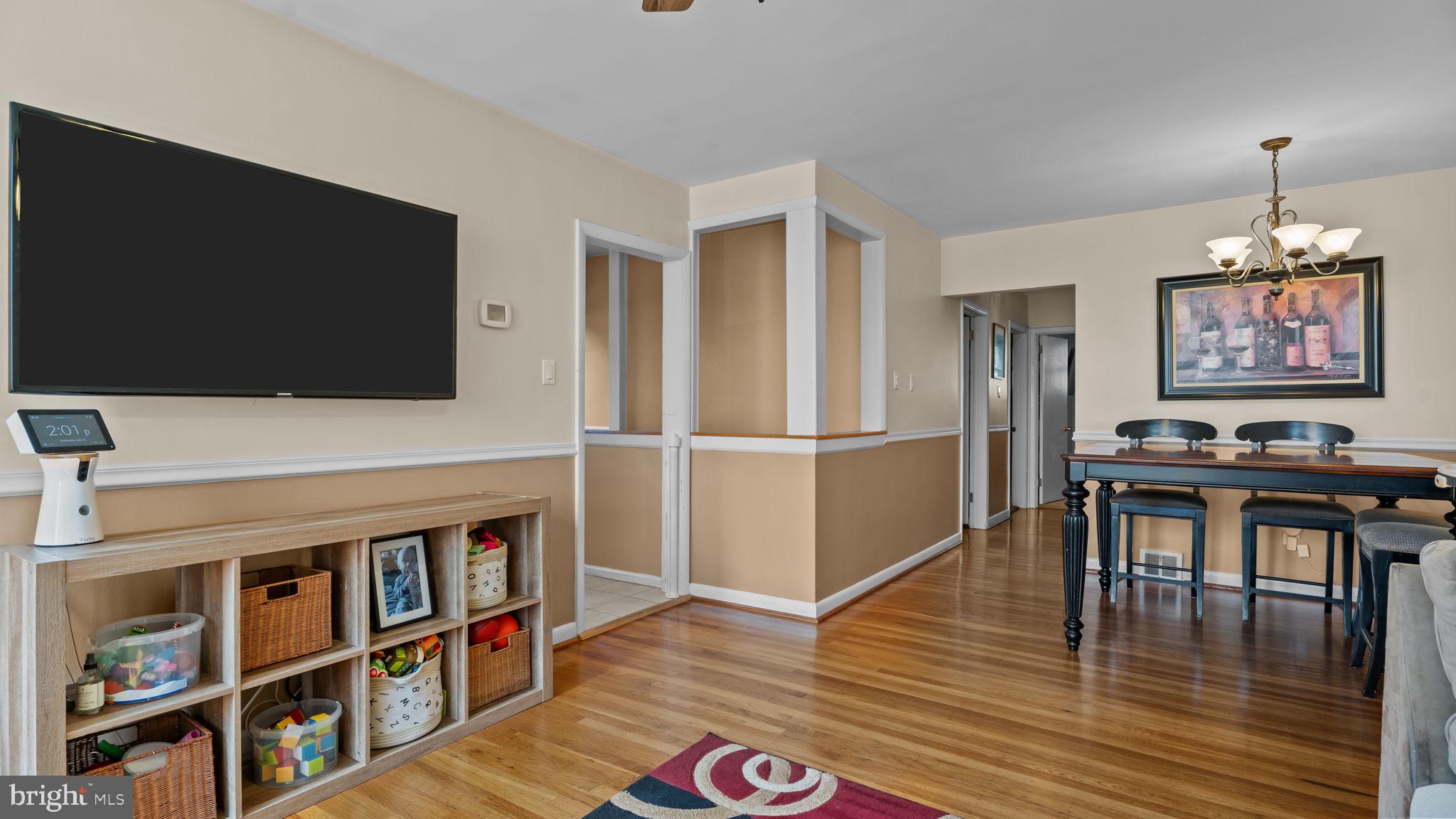 526 Palmer Road Conshohocken, PA 19428 - Photo 6 of 31 a living room with furniture and a flat screen tv