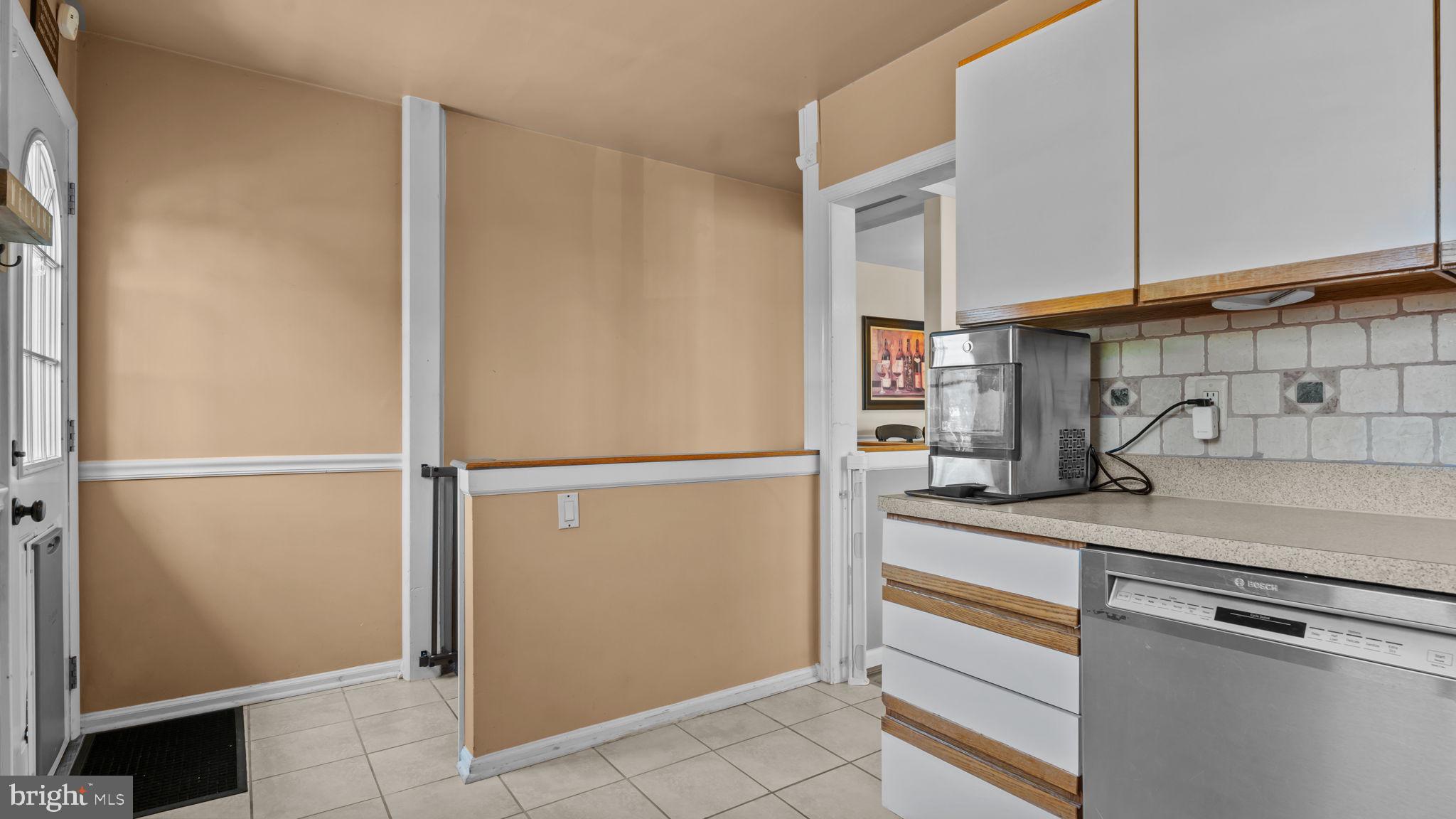526 Palmer Road Conshohocken, PA 19428 - Photo 9 of 31 a kitchen with a refrigerator and a sink