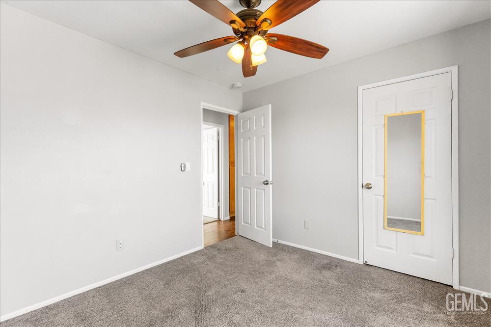 Undisclosed Address Tehachapi, CA 93561 - Photo 15 of 32 a view of a livingroom with a chandelier fan