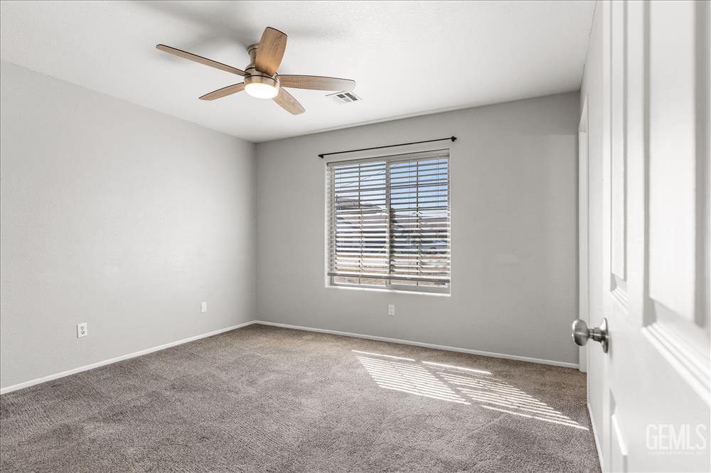 Undisclosed Address Tehachapi, CA 93561 - Photo 16 of 32 a view of an empty room with a window