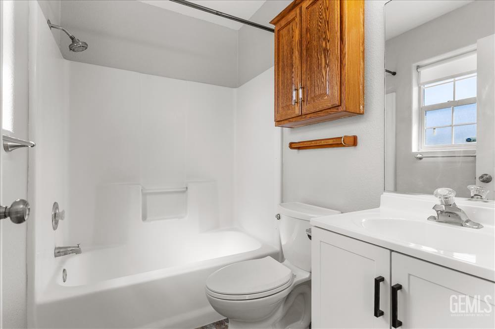 Undisclosed Address Tehachapi, CA 93561 - Photo 18 of 32 a bathroom with a sink a toilet and shower