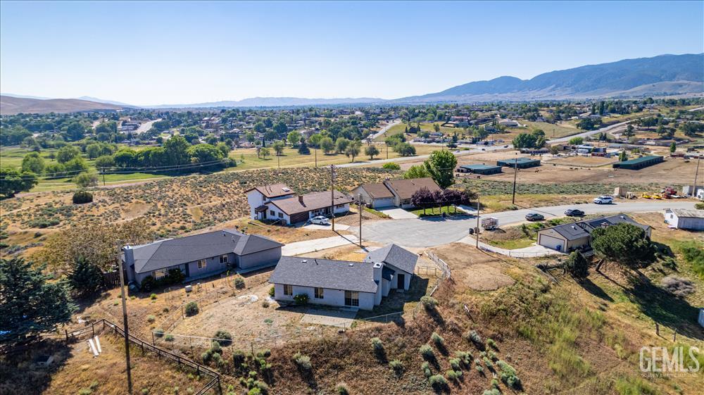 Undisclosed Address Tehachapi, CA 93561 - Photo 24 of 32 an aerial view of a house with a lake view