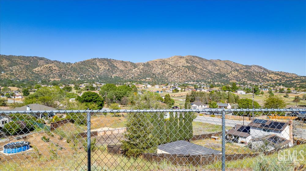 Undisclosed Address Tehachapi, CA 93561 - Photo 29 of 32 a view of a lake with a mountain