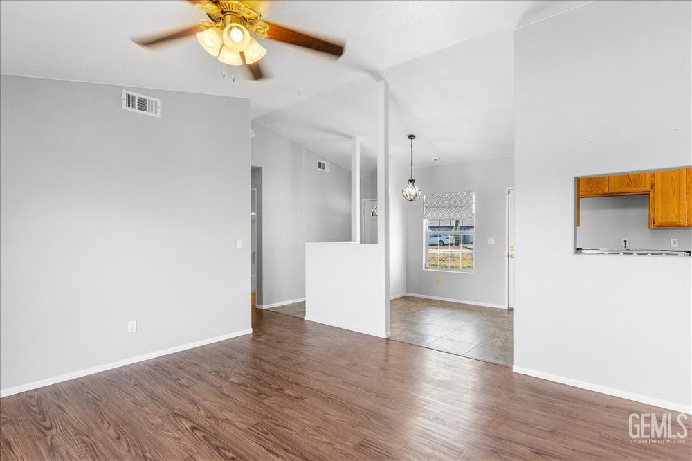 Undisclosed Address Tehachapi, CA 93561 - Photo 9 of 32 a view of a kitchen with a dishwasher cabinets and wooden floor