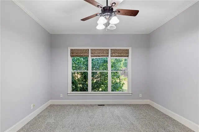 a spacious bathroom with a tub sink shower and mirror