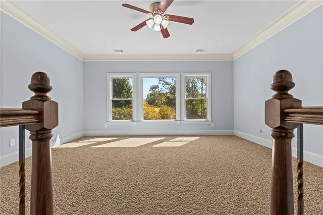 a view of a swimming pool with an outdoor seating