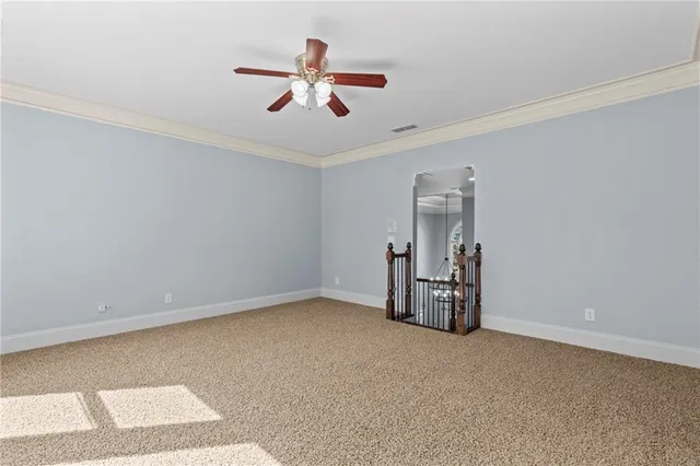 an aerial view of a house with a yard and garden