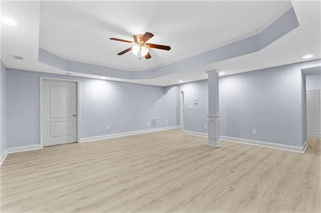 an aerial view of a house with a yard and garden