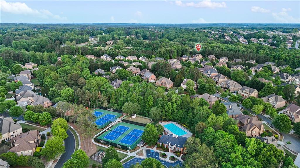 3302 Anna Ruby Lane Northeast Buford, GA 30519 - Photo 67 of 67 an aerial view of a house with a yard