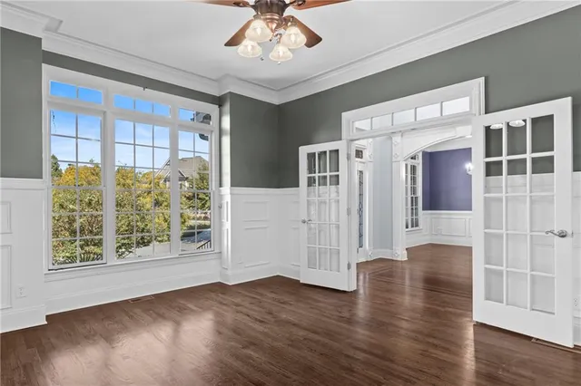 a view of entryway with wooden floor