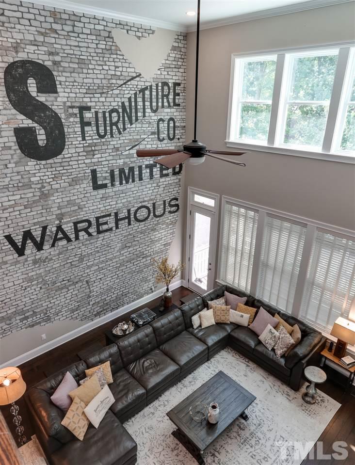 8105 Greys Landing Way Raleigh, NC 27615 - Photo 20 of 30 a room with gym equipment and a large window
