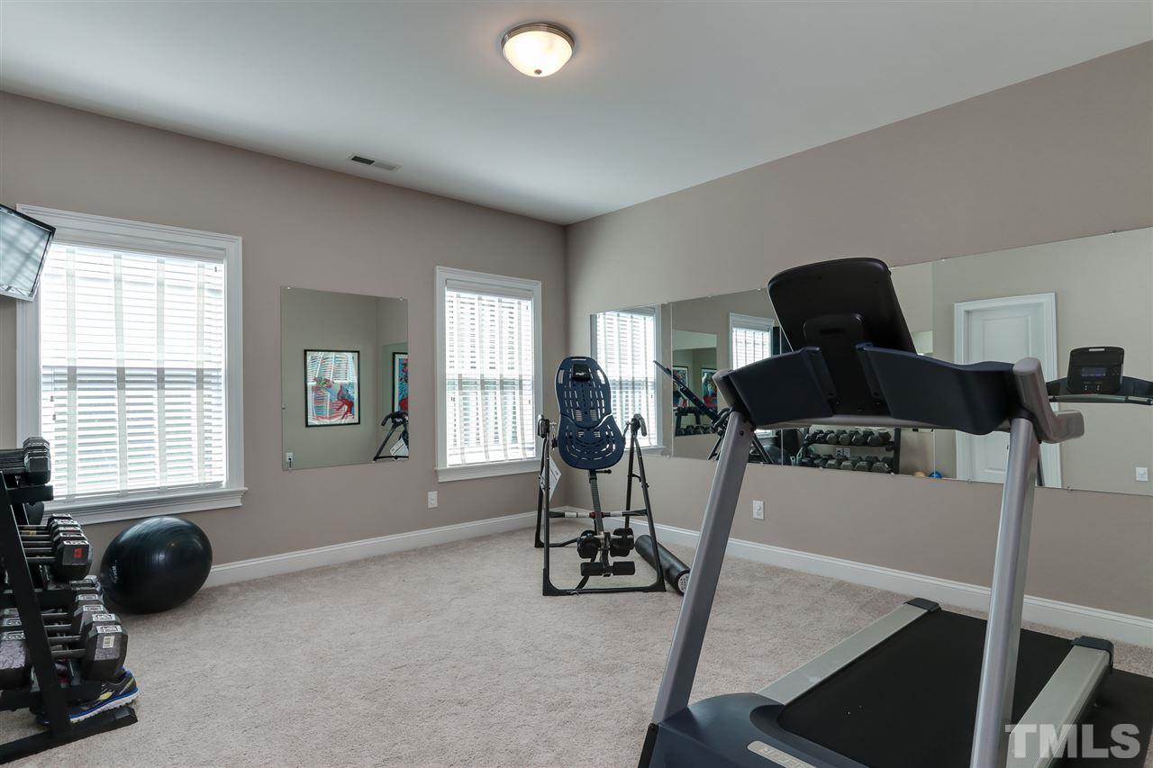 8105 Greys Landing Way Raleigh, NC 27615 - Photo 23 of 30 a view of a livingroom with furniture and windows