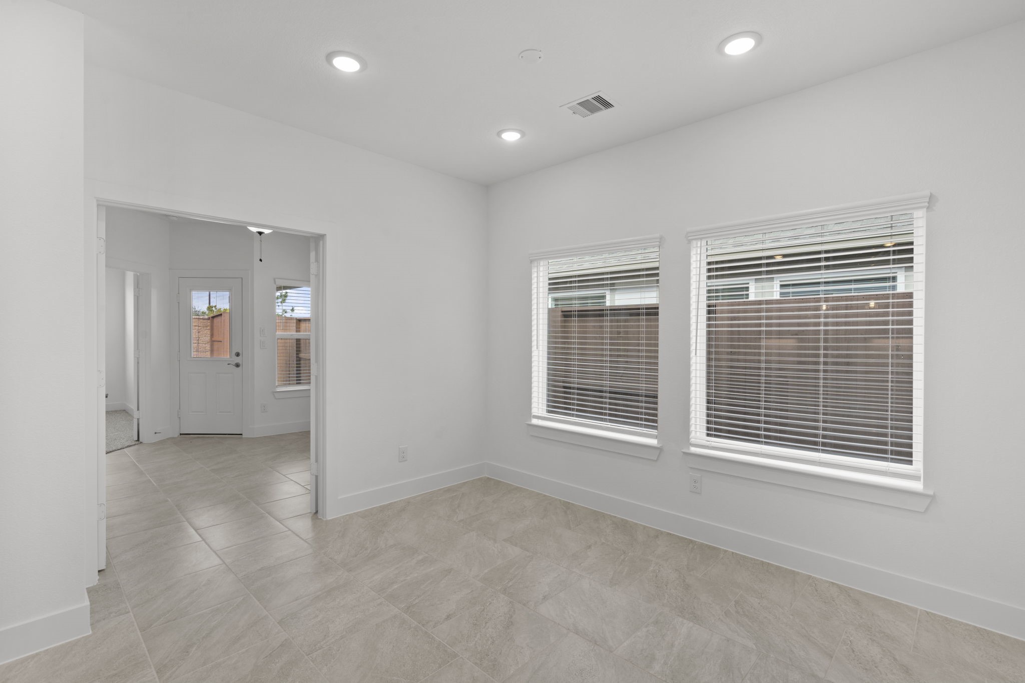 5231 Celestial Court Iowa Colony, TX 77583 - Photo 12 of 37 an empty room with windows