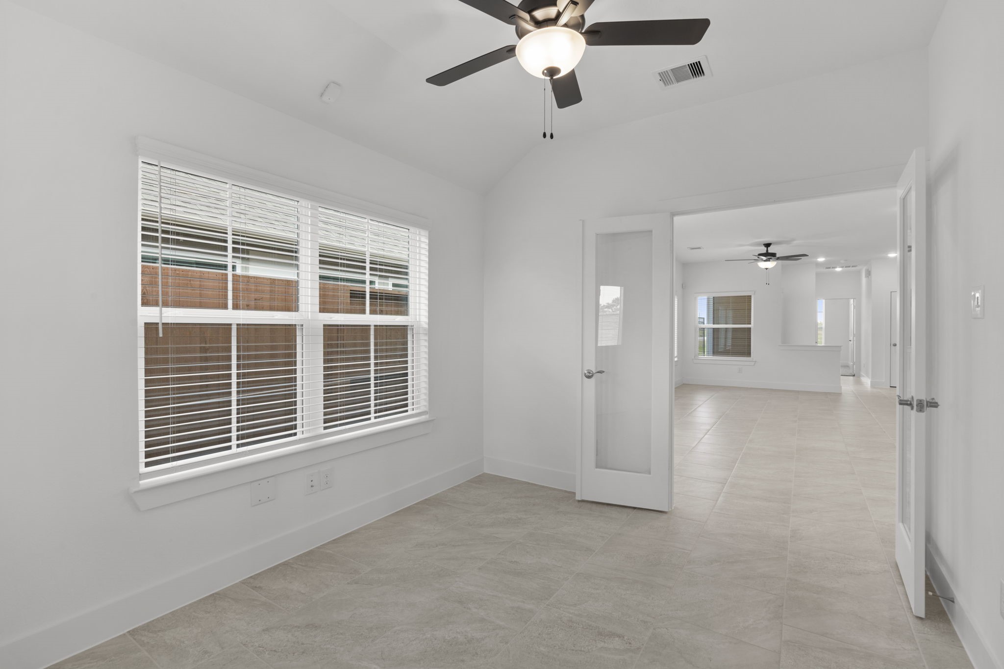 5231 Celestial Court Iowa Colony, TX 77583 - Photo 19 of 37 a view of an empty room with a window