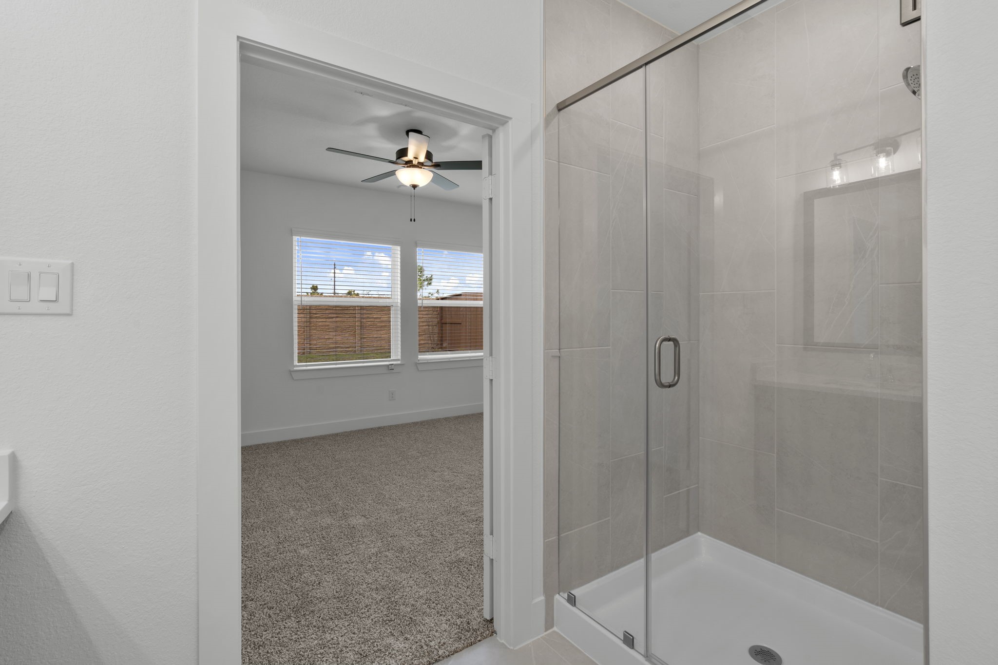 5231 Celestial Court Iowa Colony, TX 77583 - Photo 23 of 37 a very nice looking room with a chandelier fan and a window