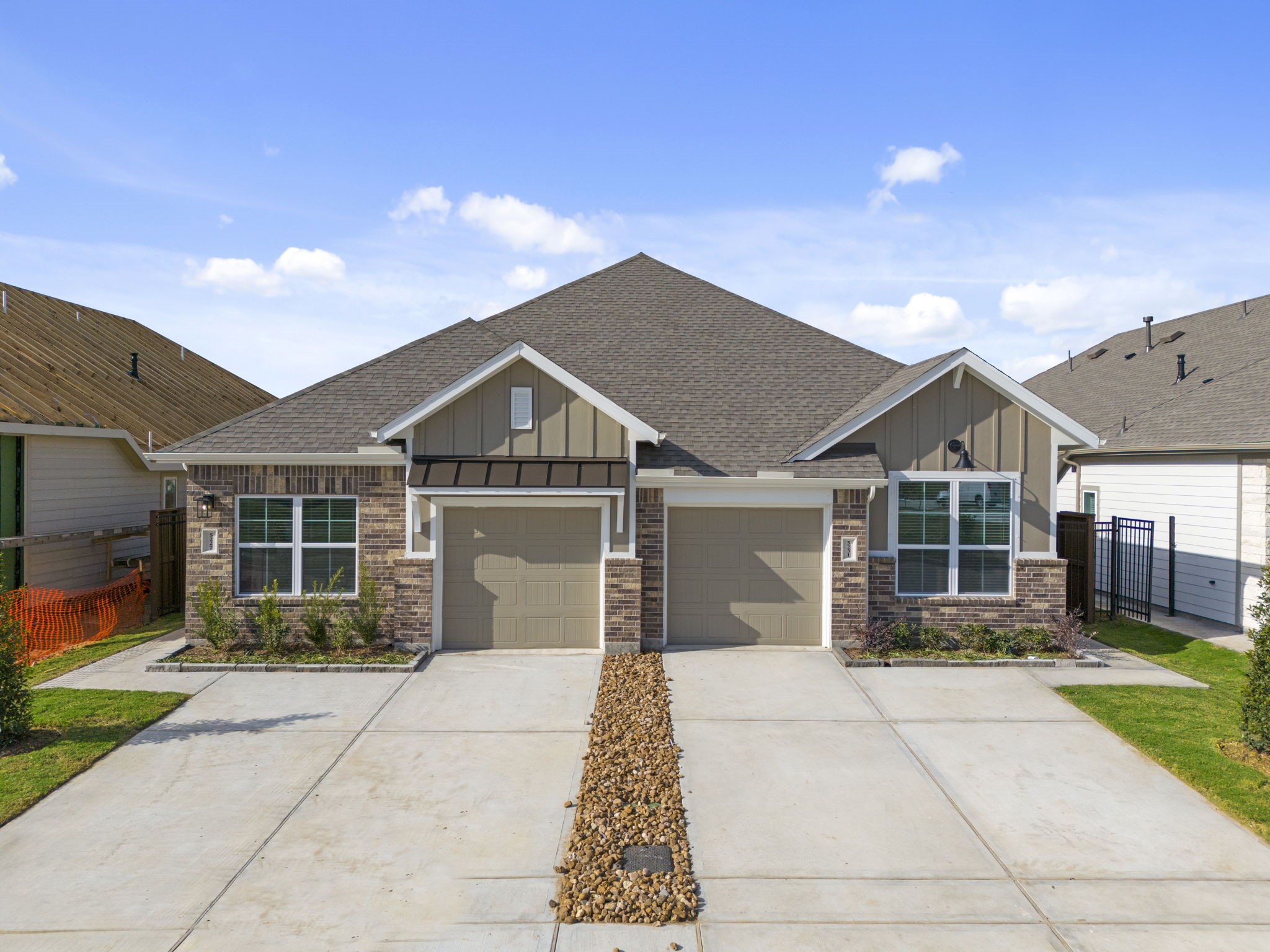 5231 Celestial Court Iowa Colony, TX 77583 - Photo 3 of 37 a front view of a house with a yard and potted plants