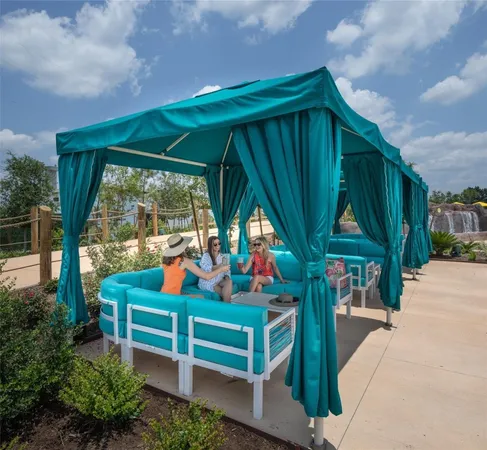 a view of front door with outdoor seating