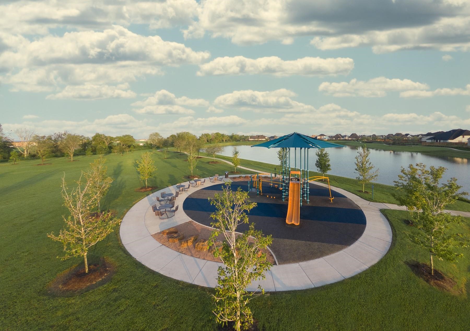 5231 Celestial Court Iowa Colony, TX 77583 - Photo 35 of 37 a view of a lake with a garden