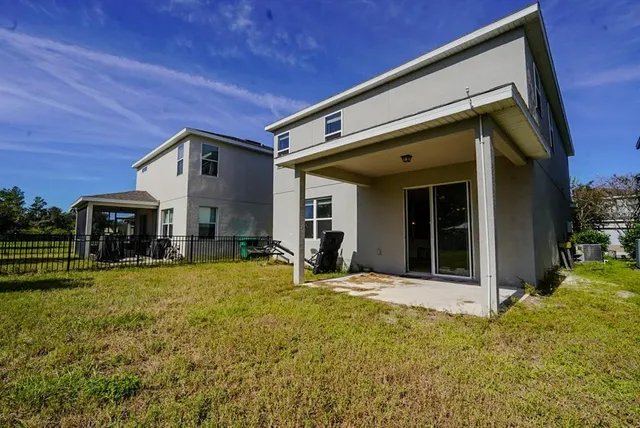 a view of a house with a patio