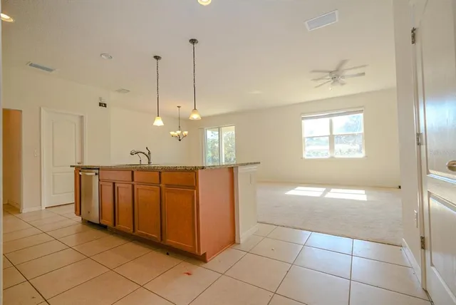 a view of a kitchen with an entryway